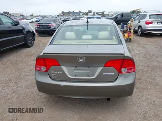2006 Honda Civic z VIN JHMFA36286S006836, wystawiony jako IAAI lot #42324244 z przebiegiem 217 417 mil mil oraz . Historia ofert i sprzedaży dostępna na DreamBid. Obrazek 16.