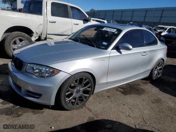 2009 BMW 1 Series 128i SULEV with VIN WBAUP93529VF48915, listed as a Copart auction lot 80310034 with 143,208 mi miles and Salvage Title. Bid and sale history available at carsss.com. Image 1.