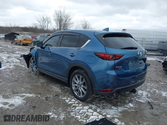 2020 Mazda CX-5 Grand Touring with VIN JM3KFBDM2L0778831, listed as a IAAI auction lot 41739655 with 72,533 mi miles. Bid and sale history available at carsss.com. Image 3.