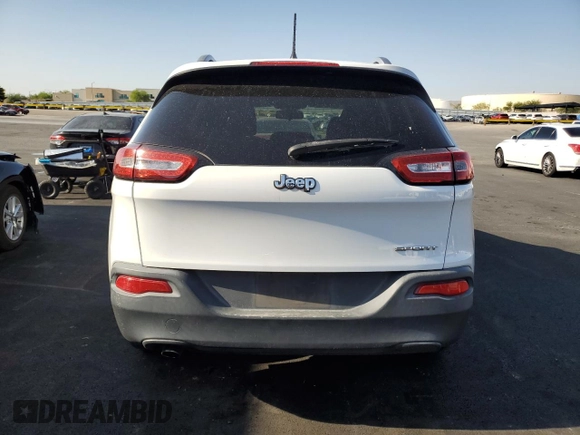 2015 Jeep Cherokee Sport with VIN 1C4PJLAB2FW689249, listed as a Copart auction lot 61716305 with 87,987 mi miles and Salvage title. Bid and sale history available at DreamBid. Image 6.