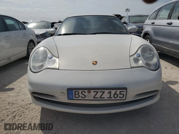 2004 Porsche 911 Carrera z VIN WP0AA29904S622574, wystawiony jako Copart lot #76657664 z przebiegiem Nie podano mil oraz Szkoda całkowita • Salvage title. Historia ofert i sprzedaży dostępna na DreamBid. Obrazek 5.