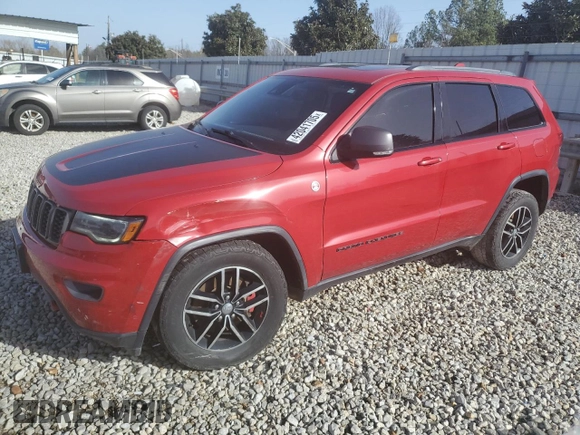 2017 Jeep Grand Cherokee Trailhawk with VIN 1C4RJFLT0HC667691, listed as a Copart auction lot 42041705 with 129,757 mi miles and Salvage title. Bid and sale history available at DreamBid. Image 1.