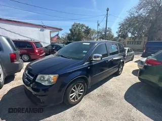 2014 Dodge Grand Caravan SXT with VIN 2C4RDGCG1ER308403, listed as a Copart auction lot 47603045 with 131,847 mi miles and Clean Title. Bid and sale history available at DreamBid. Image 2.