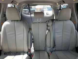2012 Toyota Sienna XLE AAS with VIN 5TDYK3DC1CS233762, listed as a Copart auction lot 59224495 with 116,155 mi miles and Salvage title. Bid and sale history available at DreamBid. Image 10.