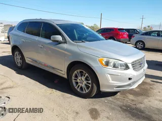 2015 Volvo XC60 T5 Drive-E Premier Plus with VIN YV440MDC0F2593317, listed as a IAAI auction lot 41306858 with 156,238 mi miles. Bid and sale history available at carsss.com. Image 1.