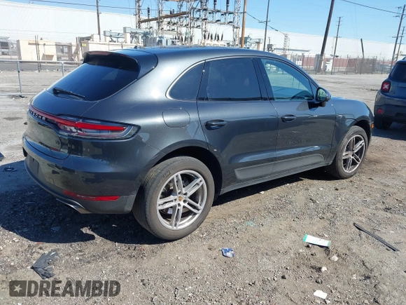 2021 Porsche Macan with VIN WP1AA2A58MLB04780, listed as a IAAI auction lot 41674377 with 55,946 mi miles and . Bid and sale history available at DreamBid. Image 4.