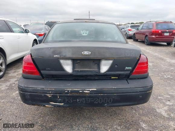 2011 Ford Crown Victoria with VIN 2FABP7AV4BX166216, listed as a IAAI auction lot 41268754 with 205,308 mi miles. Bid and sale history available at carsss.com. Image 16.