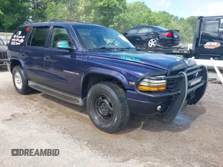 1999 Dodge Durango z VIN 1B4HS28Y4XF614928, wystawiony jako IAAI lot #42566074 z przebiegiem 340 175 mil mil oraz . Historia ofert i sprzedaży dostępna na DreamBid. Obrazek 1.