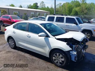 2022 Kia Rio S with VIN 3KPA24AD7NE492807, listed as a IAAI auction lot 42050520 with 100,756 mi miles. Bid and sale history available at carsss.com. Image 1.