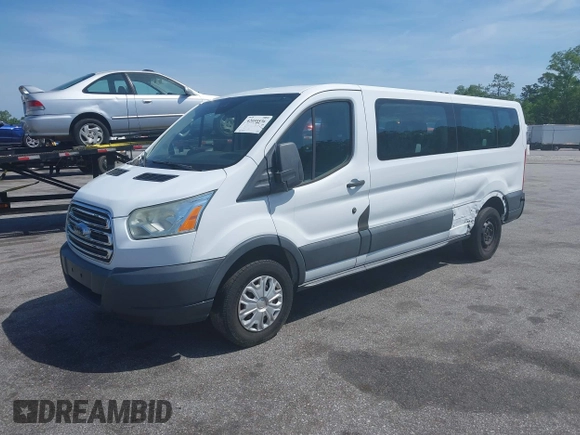 2015 Ford Transit XL z VIN 1FBZX2ZM5FKA37860, wystawiony jako IAAI lot #42059536 z przebiegiem 146 928 mil mil oraz . Historia ofert i sprzedaży dostępna na DreamBid. Obrazek 2.