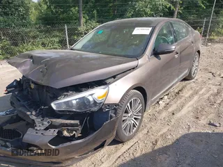 2014 Kia Cadenza Premium with VIN KNALN4D75E5146138, listed as a IAAI auction lot 39708948 with 106,767 mi miles. Bid and sale history available at carsss.com. Image 2.