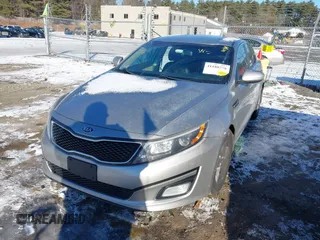2014 Kia Optima LX with VIN 5XXGM4A77EG351662, listed as a IAAI auction lot 41188778 with 200,199 mi miles. Bid and sale history available at carsss.com. Image 2.
