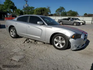 2012 Dodge Charger SE with VIN 2C3CDXBG4CH202252, listed as a Copart auction lot 52759165 with 149,492 mi miles and Salvage Title. Bid and sale history available at carsss.com. Image 4.