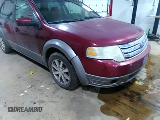 2008 Ford Taurus X SEL with VIN 1FMDK05W98GA37104, listed as a IAAI auction lot 42123902 with 166,739 mi miles and . Bid and sale history available at DreamBid. Image 6.
