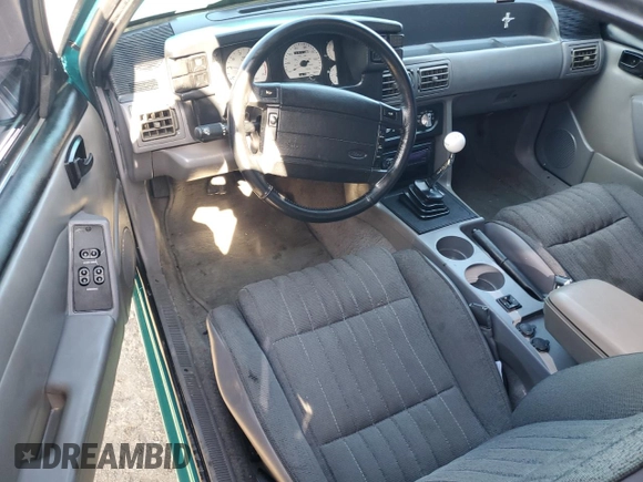 1993 Ford Mustang z VIN 1FACP40E9PF168633, wystawiony jako Copart lot #71578014 z przebiegiem 954 mil mil oraz Szkoda całkowita • Salvage title. Historia ofert i sprzedaży dostępna na DreamBid. Obrazek 8.