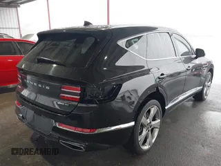 2021 Genesis GV80 with VIN KMUHCESC1MU046768, listed as a IAAI auction lot 41424946 with 18,471 mi miles and . Bid and sale history available at DreamBid. Image 4.