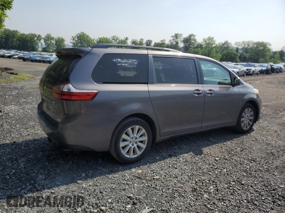 2015 Toyota Sienna LE with VIN 5TDJK3DC0FS112243, listed as a Copart auction lot 61791405 with 86,039 mi miles and Salvage title. Bid and sale history available at DreamBid. Image 3.