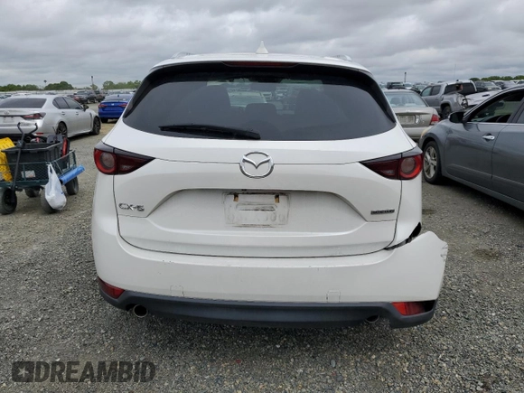 2020 Mazda CX-5 Touring with VIN JM3KFACM0L0857278, listed as a Copart auction lot 51980825 with 73,411 mi miles and Salvage Title. Bid and sale history available at carsss.com. Image 6.