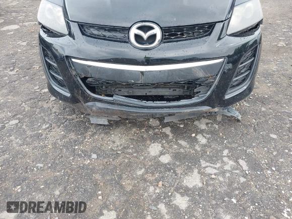 2011 Mazda CX-7 S Touring z VIN JM3ER4CL2B0362415, wystawiony jako IAAI lot #42214144 z przebiegiem 156 976 mil mil oraz . Historia ofert i sprzedaży dostępna na DreamBid. Obrazek 6.