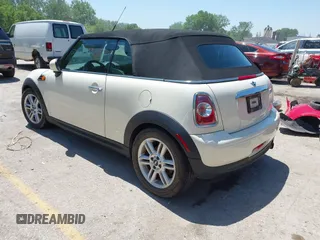 2012 MINI Convertible with VIN WMWZN3C51CT134646, listed as a IAAI auction lot 42252740 with 124,278 mi miles and . Bid and sale history available at DreamBid. Image 3.