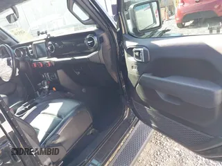 2021 Jeep Wrangler Unlimited Sahara with VIN 1C4HJXEG4MW650547, listed as a IAAI auction lot 42052146 with 26,983 mi miles and . Bid and sale history available at DreamBid. Image 5.