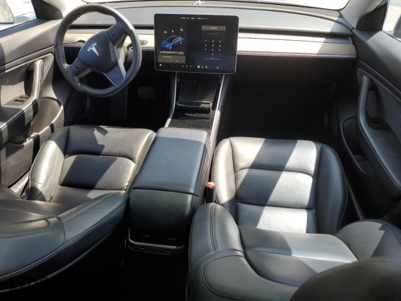 2019 Tesla Model 3 Mid Range with VIN 5YJ3E1EA0KF466585, listed as a Copart auction lot 50313695 with 70,703 mi miles and Salvage Title. Bid and sale history available at carsss.com. Image 8.
