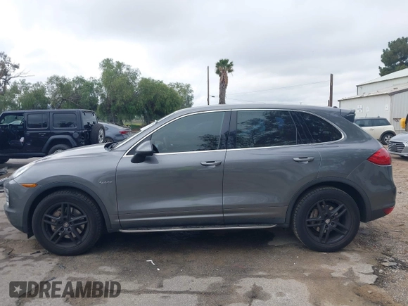 2012 Porsche Cayenne S Hybrid with VIN WP1AE2A25CLA90636, listed as a IAAI auction lot 41922089 with 90,318 mi miles and . Bid and sale history available at DreamBid. Image 15.