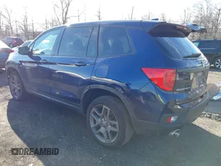 2023 Honda Passport EX-L with VIN 5FNYF8H51PB028045, listed as a IAAI auction lot 41609342 with 52,920 mi miles and . Bid and sale history available at DreamBid. Image 3.