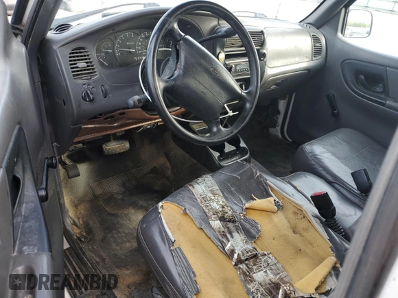 2002 Ford Ranger XL with VIN 1FTYR10DX2TA66722, listed as a Copart auction lot 54425765 with 246,813 mi miles and Non repairable. Bid and sale history available at DreamBid. Image 8.