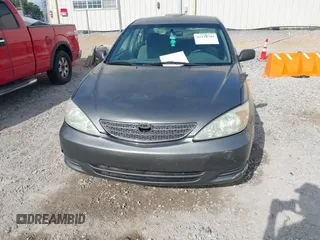 2003 Toyota Camry LE with VIN 4T1BE32K03U727447, listed as a IAAI auction lot 42118785 with 325,881 mi miles and . Bid and sale history available at DreamBid. Image 6.