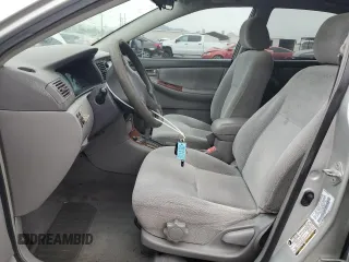 2004 Toyota Corolla CE with VIN 1NXBR32E34Z297414, listed as a Copart auction lot 52541105 with 147,072 mi miles and Salvage Title. Bid and sale history available at DreamBid. Image 7.