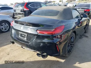 2022 BMW Z4 sDriveM40i with VIN WBAHF9C08NWX38258, listed as a IAAI auction lot 41462157 with 43,534 mi miles. Bid and sale history available at carsss.com. Image 4.