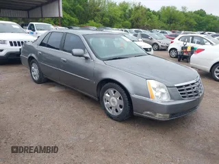 2006 Cadillac DTS w/1SC with VIN 1G6KD57YX6U117496, listed as a IAAI auction lot 41963056 with 167,216 mi miles. Bid and sale history available at carsss.com. Image 1.