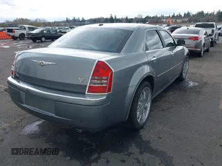 2007 Chrysler 300 C with VIN 2C3KA63H97H833171, listed as a IAAI auction lot 41867040 with 75,084 mi miles. Bid and sale history available at carsss.com. Image 4.
