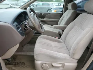 1998 Toyota Sienna LE with VIN 4T3ZF13C4WU016157, listed as a Copart auction lot 58354384 with 271,266 mi miles and Clean Title. Bid and sale history available at carsss.com. Image 7.