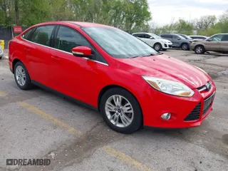 2012 Ford Focus SEL with VIN 1FAHP3H27CL387807, listed as a IAAI auction lot 42056056 with 113,194 mi miles. Bid and sale history available at carsss.com. Image 1.