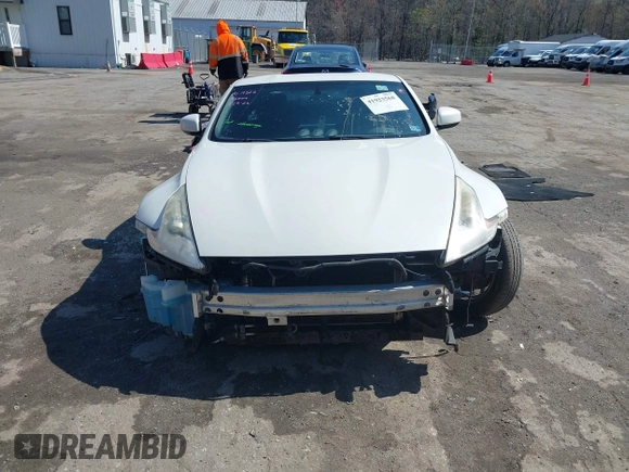 2014 Nissan 370Z with VIN JN1AZ4EH8EM634403, listed as a IAAI auction lot 41923568 with 137,676 mi miles. Bid and sale history available at carsss.com. Image 12.