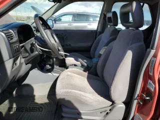 1999 Isuzu Rodeo S with VIN 4S2CM58WXX4318576, listed as a Copart auction lot 44378265 with 258,981 mi miles and Salvage Title. Bid and sale history available at DreamBid. Image 7.