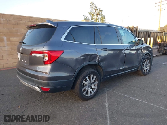 2021 Honda Pilot EX-L with VIN 5FNYF5H54MB018846, listed as a IAAI auction lot 41208987 with 80,757 mi miles and . Bid and sale history available at DreamBid. Image 4.