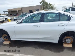 2021 BMW 3 Series 330i z VIN 3MW5R1J08M8C07261, wystawiony jako IAAI lot #41861814 z przebiegiem 87 426 mil mil oraz . Historia ofert i sprzedaży dostępna na DreamBid. Obrazek 14.