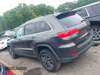 2019 Jeep Grand Cherokee Altitude with VIN 1C4RJEAG7KC556191, listed as a IAAI auction lot 42160524 with 96,373 mi miles and . Bid and sale history available at DreamBid. Image 13.