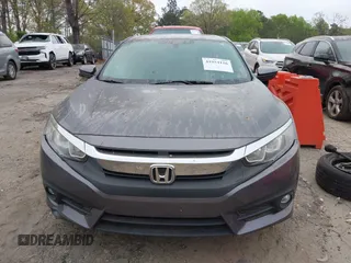 2017 Honda Civic EX-L with VIN 19XFC1F75HE200211, listed as a IAAI auction lot 41954126 with 105,637 mi miles and . Bid and sale history available at DreamBid. Image 12.
