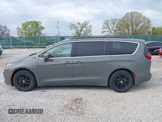 2022 Chrysler Pacifica Touring L with VIN 2C4RC1BG7NR168519, listed as a IAAI auction lot 41928929 with 55,814 mi miles and . Bid and sale history available at DreamBid. Image 14.