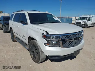 2018 Chevrolet Tahoe LT with VIN 1GNSCBKC8JR128476, listed as a IAAI auction lot 41447799 with 105,209 mi miles. Bid and sale history available at carsss.com. Image 1.