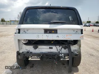2023 Rivian R1S Adventure z VIN 7PDSGABA7PN021756, wystawiony jako Copart lot #67650414 z przebiegiem 3284 mil mil oraz Szkody całkowita. Historia ofert i sprzedaży dostępna na DreamBid. Obrazek 6.