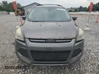 2013 Ford Escape SEL z VIN 1FMCU9HX7DUC11052, wystawiony jako Copart lot #62377515 z przebiegiem 225 704 mil mil oraz Szkoda całkowita • Salvage title. Historia ofert i sprzedaży dostępna na DreamBid. Obrazek 5.