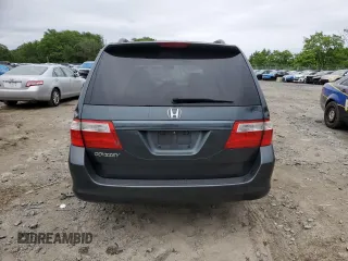 2006 Honda Odyssey EX-L z VIN 5FNRL38706B019434, wystawiony jako Copart lot #57397755 z przebiegiem 175 406 mil mil oraz Szkoda całkowita • Salvage title. Historia ofert i sprzedaży dostępna na DreamBid. Obrazek 6.