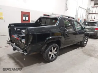 2014 Honda Ridgeline SE with VIN 5FPYK1F63EB013811, listed as a IAAI auction lot 41422016 with 168,653 mi miles. Bid and sale history available at carsss.com. Image 4.