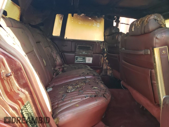 1992 Cadillac Brougham z VIN 1G6DW54E8NR712443, wystawiony jako Copart lot #51482635 z przebiegiem Nie podano mil oraz Nie do naprawy. Historia ofert i sprzedaży dostępna na DreamBid. Obrazek 10.