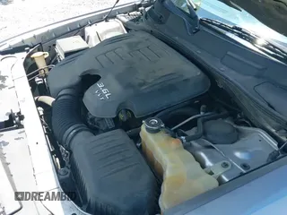 2013 Dodge Challenger SXT z VIN 2C3CDYAG6DH680794, wystawiony jako IAAI lot #43140092 z przebiegiem 162 518 mil mil oraz . Historia ofert i sprzedaży dostępna na DreamBid. Obrazek 22.